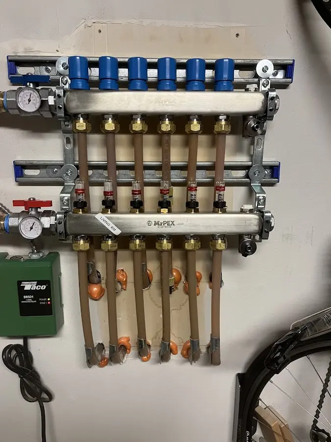 Plumber performing Leak Detection at a residential property in Goldstream