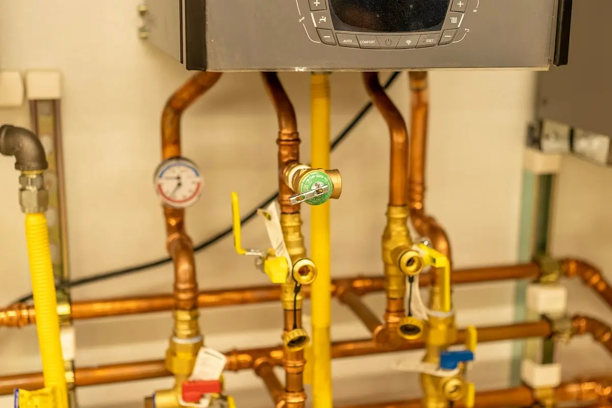 Licensed technician providing Backflow Prevention for a homeowner in Goldstream